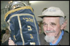 Smolensk Residents Welcome Torah Scroll With Dancing